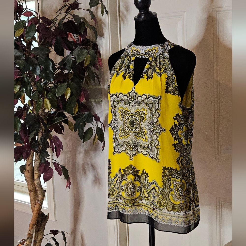 Caché yellow print top - size M. Cool pattern and tie back detail.